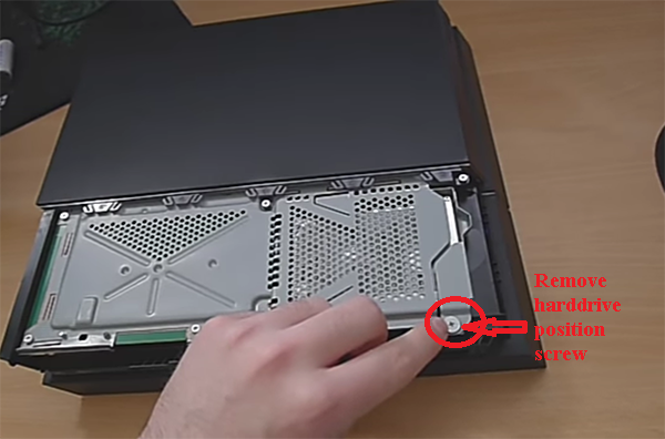 remove hard-drive screw. PS4 console