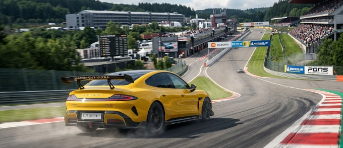  A high-performance Xiaomi SU7 Ultra Production Version in bright yellow racing on a professional track.