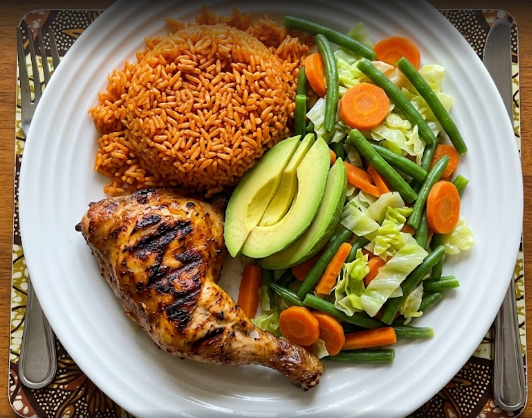 A balanced plate demonstrating how to transform popular rice dishes using vegetables, healthy fats, and grilled protein.

