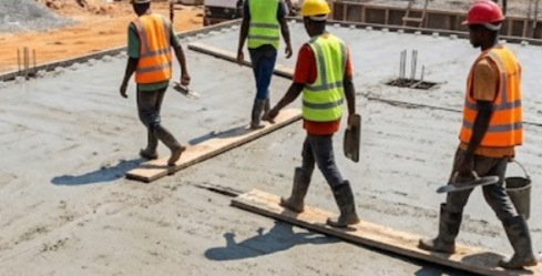 A guide explaining the safe timing for walking and placing loads on newly poured slabs during site construction.
